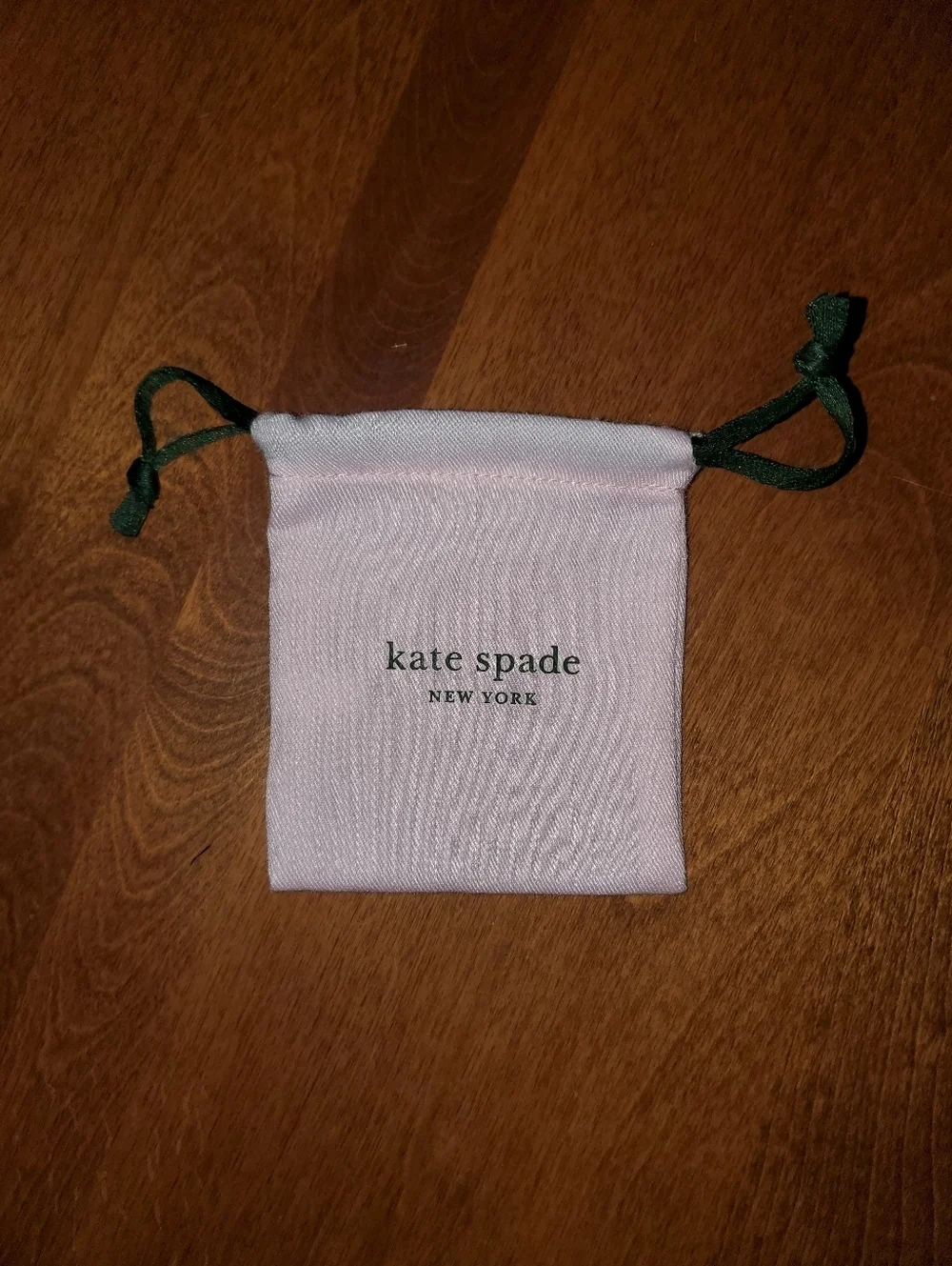 kate spade Pink Drawstring Jewelry Pouch with Green Cords